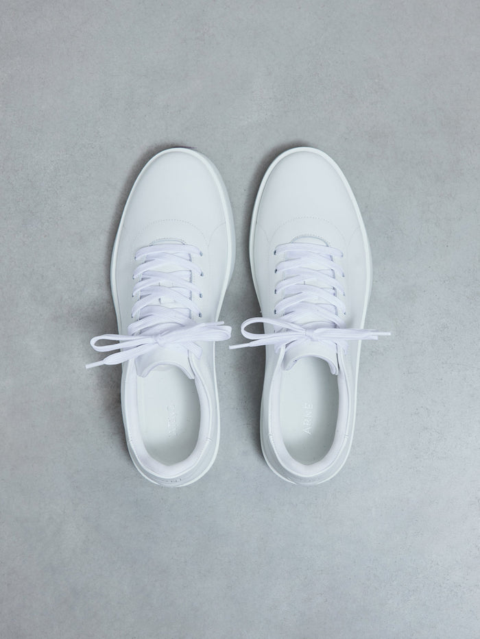 Tennis Trainer in Triple White